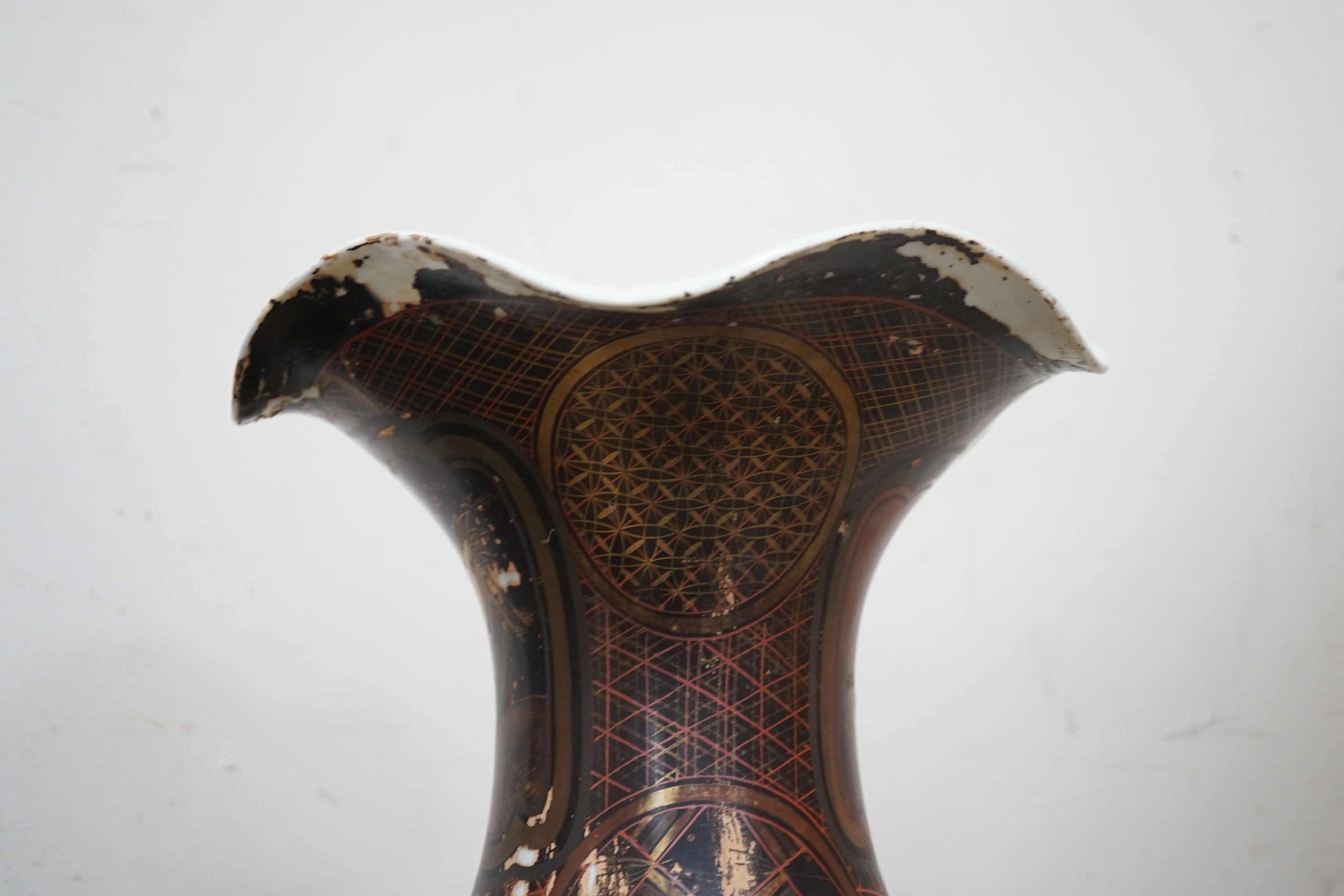 A large Japanese lacquered porcelain vase and a Japanese celadon ground jardiniere-vase 50 cms high.